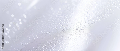 An abstract pure white background with drops of water. 