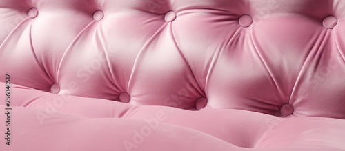 Pink velour upholstery featuring button details for design projects with a soft texture.
