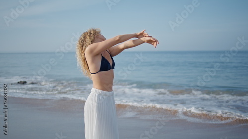 Tableau sur toile Gentle dancer moving body sensually on summer beach