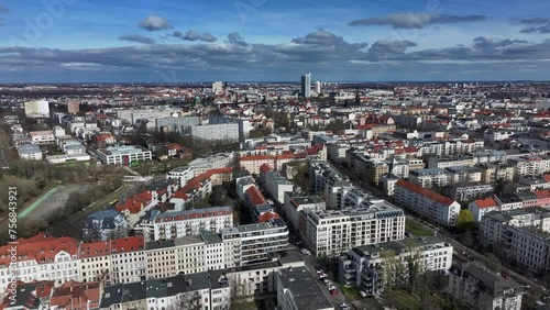 Slow flight from the direction of Leipzig city center. Houses from the Wilhelminian era in the foreground. the horse racing track appears on the left edge of the picture. photo