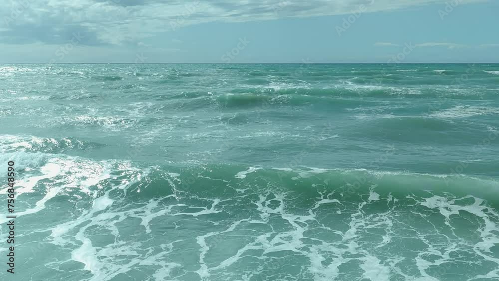 Creating a wave in the sea with foam in slow motion 2 Creating a wave in the sea with foam in slow motion 2