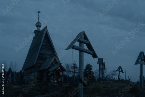 Ples town at Ivanovo region in Russia in the dusk. Wooden church on Levitan mountain