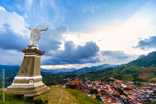 Christ the Redeemer on top of a hill with the town of Jerico in the background in Colombia © simonmayer