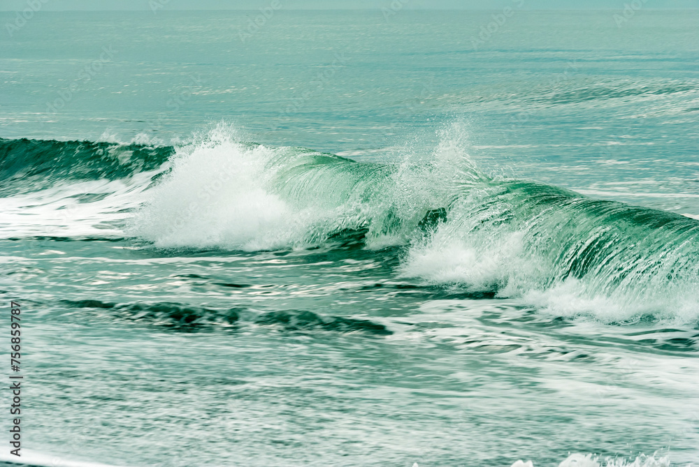 Wave in the Pacific Ocean coastal shore in Guatemala, fresh vacations on the seashore, relaxing and colorful space, force of nature.