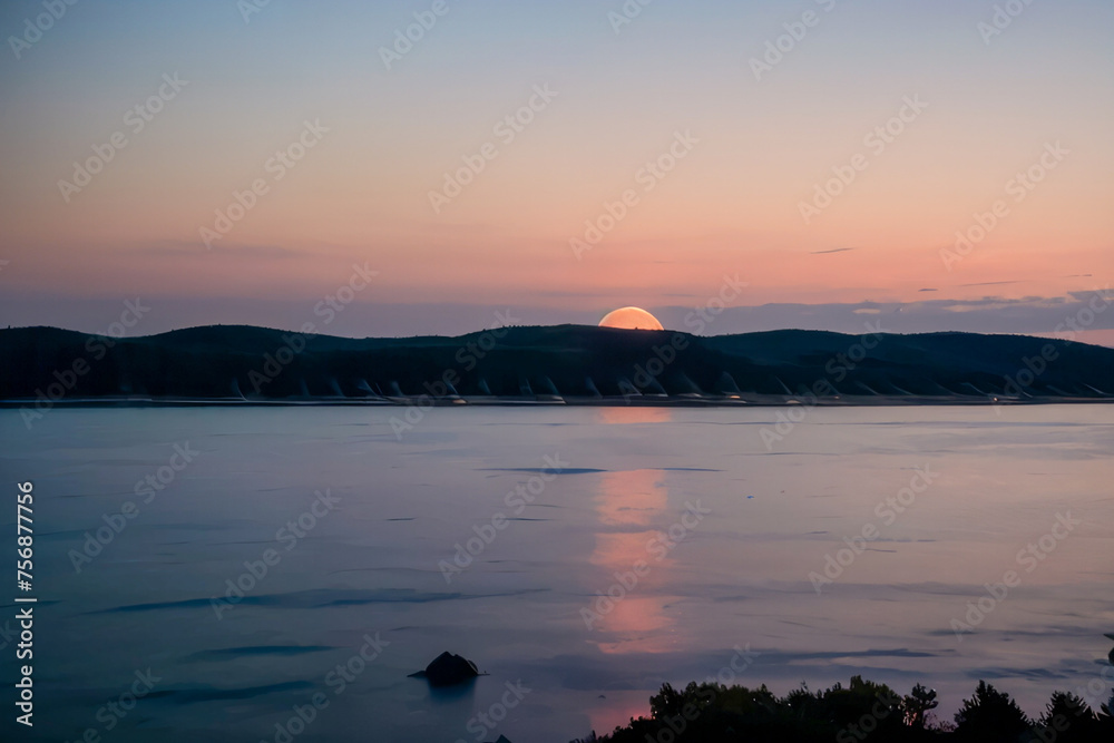 Naklejka premium sunset over the lake