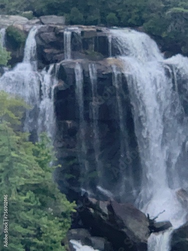 waterfall in the forest mountains