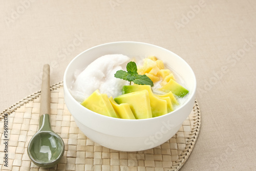 Es teler or es teller, Indonesian dessert, consist of avocado, young coconut, jackfruit, served with coconut milk or sweetened condensed milk. 
