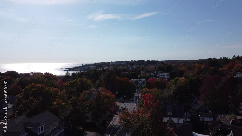 Aerial of Ogunquit Main USA drone fly above traffic road and revealing scenic coastline during sunny day Aerial of Ogunquit Main USA drone fly above traffic road and revealing scenic coastline during sunny day