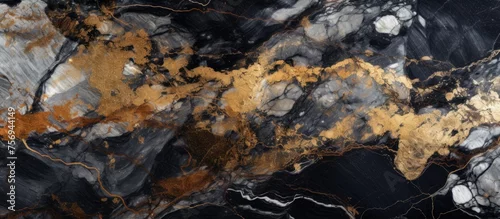 Panel kuchenny z motywem Patterned black and brown marble texture background contrasted with gold and white for product design.