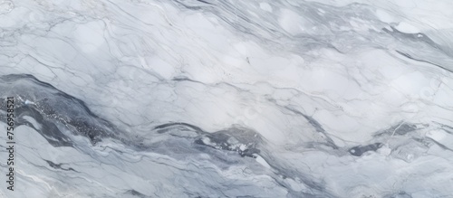 A white marble tile with a gray marble texture resembling a snowy landscape, creating a fluid and calming effect like a gentle wave in the wind