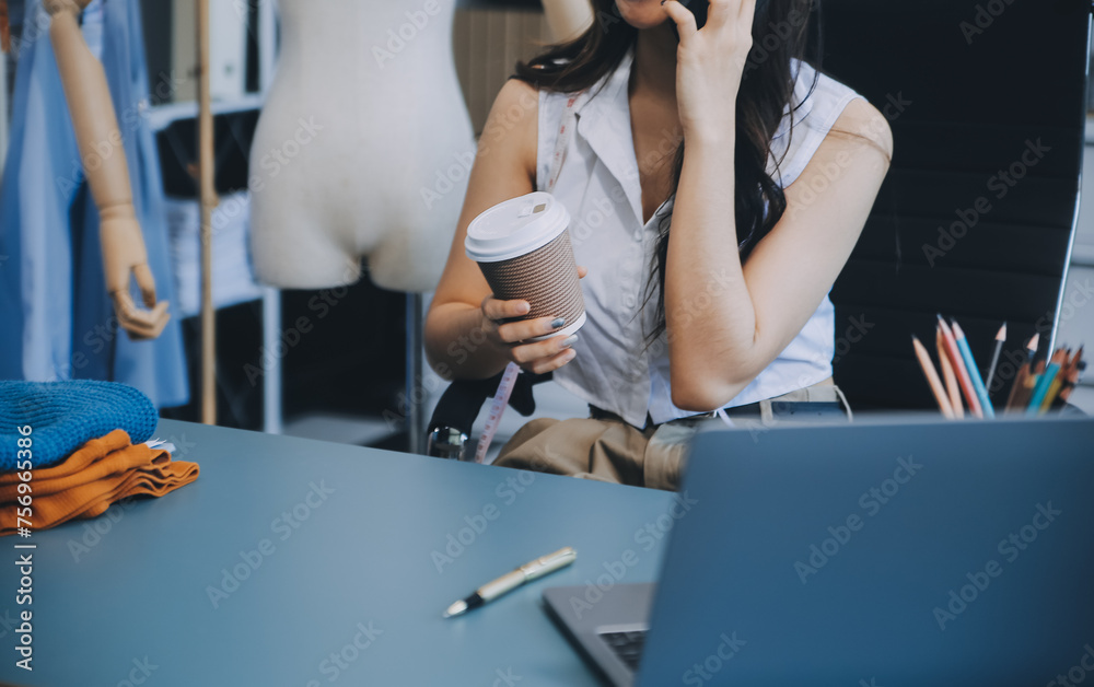 Young woman small business owner working at home office. Online marketing packaging delivery, startup SME entrepreneur or freelance woman concept. Small business owener