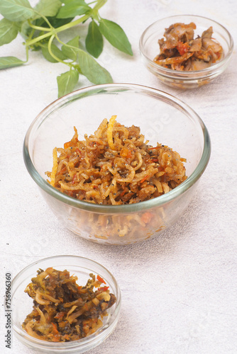 sambal goreng teri or anchovy chilli one of traditional food from indonesia, serve in medium glass bowl photo