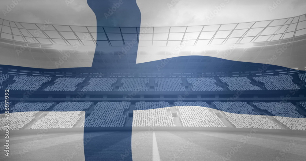 Fototapeta premium Image of waving flag of finland over sport stadium