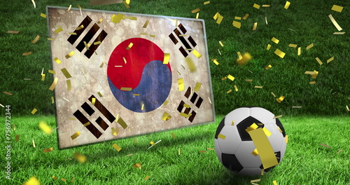 Image of falling gold confetti over korean flag and football ball