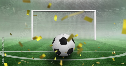 Image of confetti and football over stadium