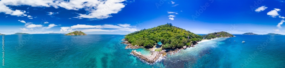 Obraz premium La Digue Island under a Blue Sky, Seychelles Aerial View
