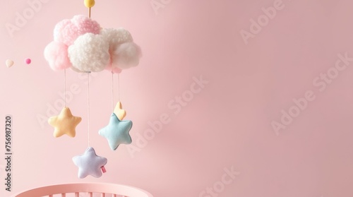 Baby mobile on pink background cute