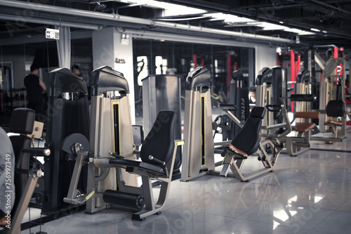 Various exercise equipment in the gym photo