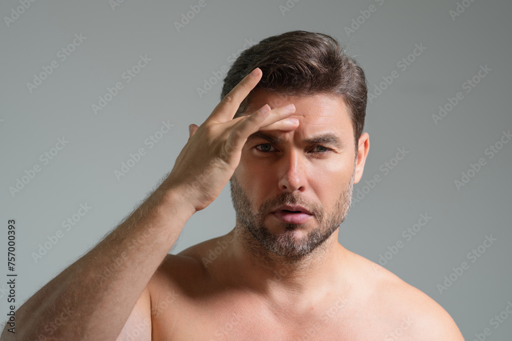 Mens skincare. Attractive man with perfect skin touch face after shaving. Skin care healthcare cosmetic procedures concept. Close up man with sensitive skin, male cosmetology treatment. Skin care. Mens skincare. Attractive man with perfect skin touch face after shaving. Skin care healthcare cosmetic procedures concept. Close up man with sensitive skin, male cosmetology treatment. Skin care.