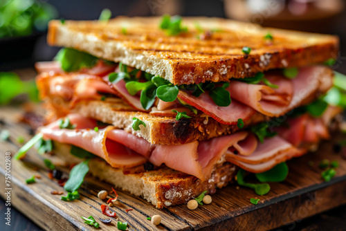 Toasted Sandwich with Ham  Melted Cheese  and Microgreens on Seeded Bread 