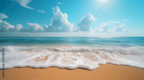 Beautiful seascape with sandy beach and blue sky with clouds photo