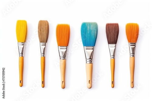 White background with isolated paintbrushes.