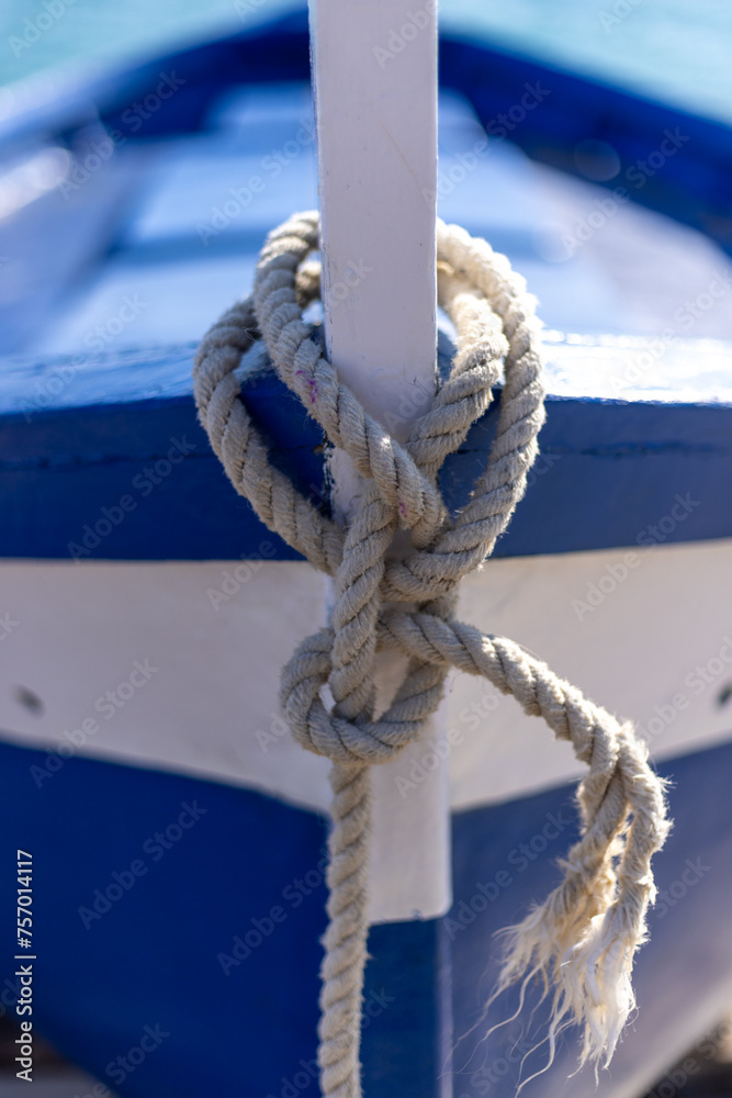 Sailor's knot on the keel of the ship with the sea in the background