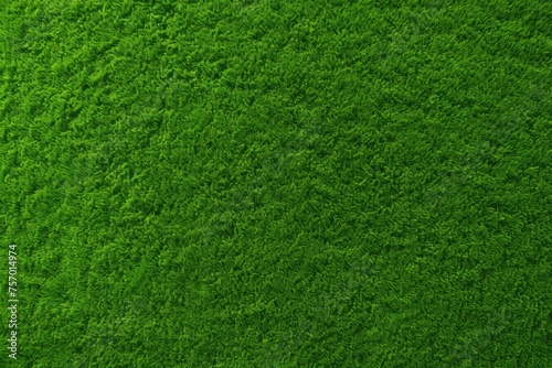 Aerial perspective of synthetic grass texture Decorative turf for garden football and golf Green backdrop photo