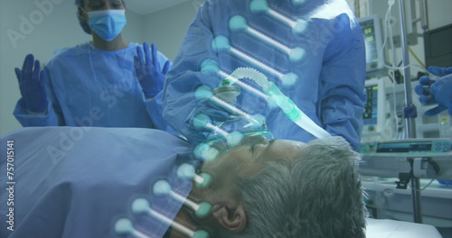 Image of dna over caucasian doctors and senior patient before operation