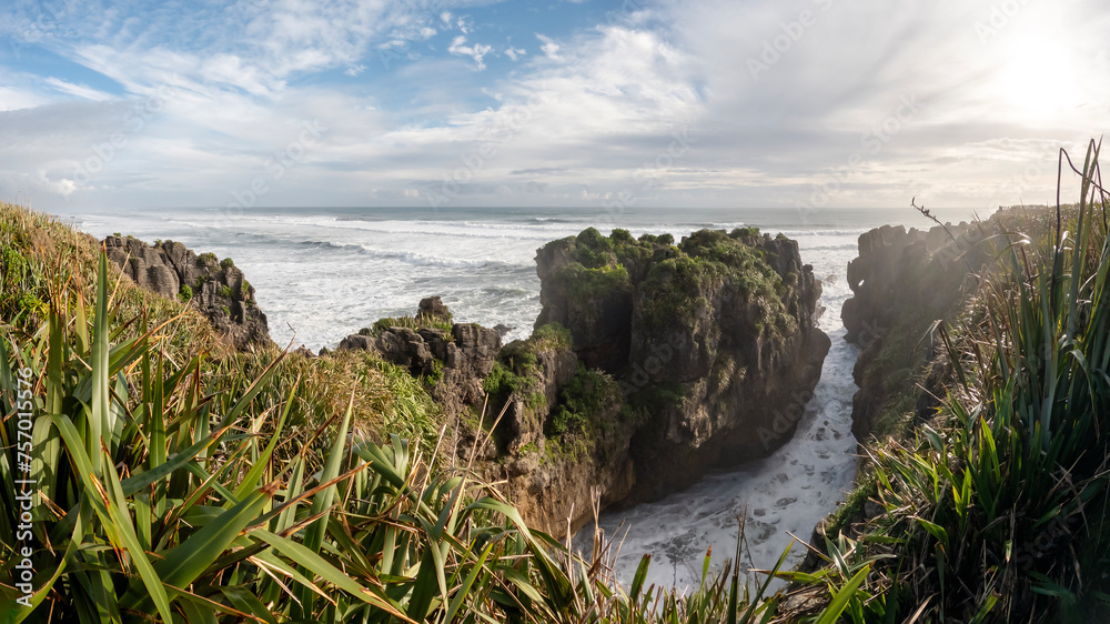 Panoramic view on Pancake Rocks and Blowholes : a coastal rock formation at Punakaiki on the West Coast of the South Island of New Zealand