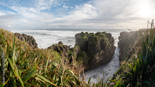 Panoramic view on Pancake Rocks and Blowholes : a coastal rock formation at Punakaiki on the West Coast of the South Island of New Zealand