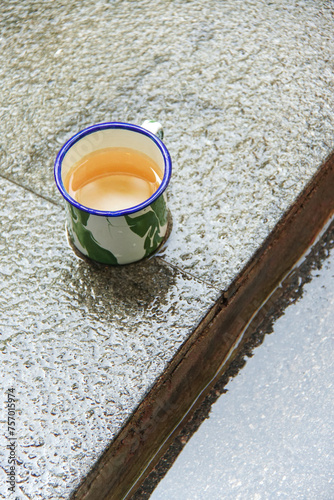 cup of tea side of the pool in the morning