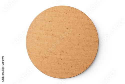 Blank round cardboard beer coaster isolated on white viewed from the front photo