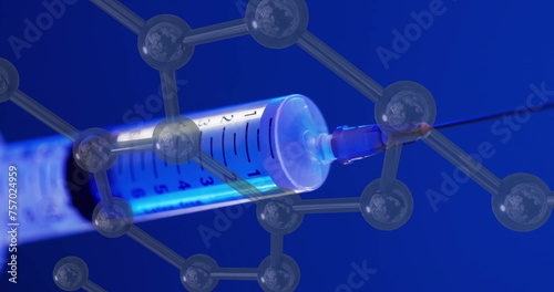 Image of molecule structures over syringe on blue background