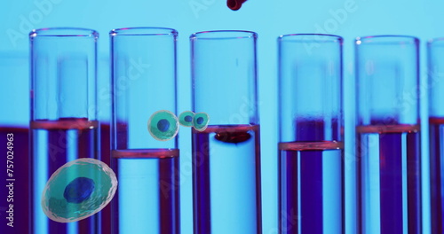 Image of white blood cells over test tubes in laboratory on blue background