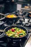 Sliced vegetables in the frying pan