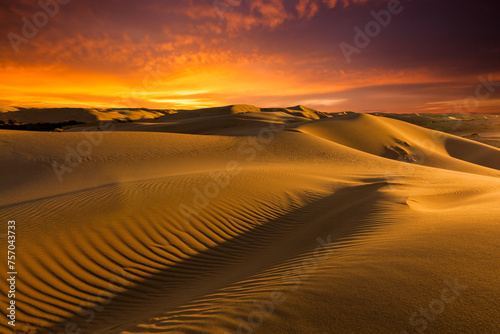 Sunset over the sand dunes in the desert. Sahara desert