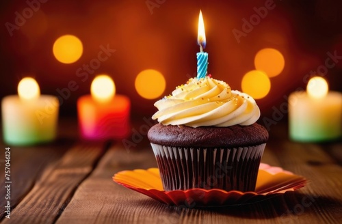 Birthday greeting concept. candle on a cupcake.