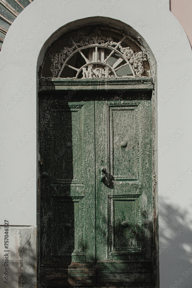 Old vintage wooden door. Travel concept. Traditional European old town building. Old historic architecture - obrazy, fototapety, plakaty 
