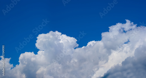 closeup cumulus clouds on blue sky background