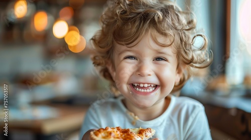 Joyful child holding a slice of cheese in a cozy home setting