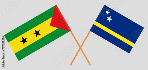 Crossed flags of Sao Tome and Principe and Country of Curacao. Official colors. Correct proportion