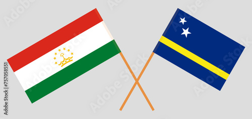 Crossed flags of Tajikistan and Country of Curacao. Official colors. Correct proportion