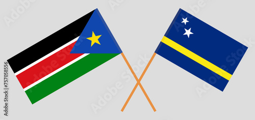 Crossed flags of South Sudan and Country of Curacao. Official colors. Correct proportion