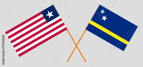 Crossed flags of Liberia and Country of Curacao. Official colors. Correct proportion