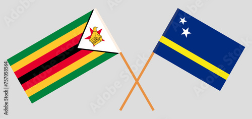 Crossed flags of Zimbabwe and Country of Curacao. Official colors. Correct proportion