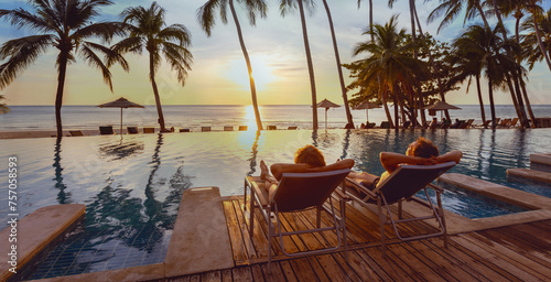 honeymoon couple relaxing near beach swimming pool in luxurious hotel, banner background, vacation travel
