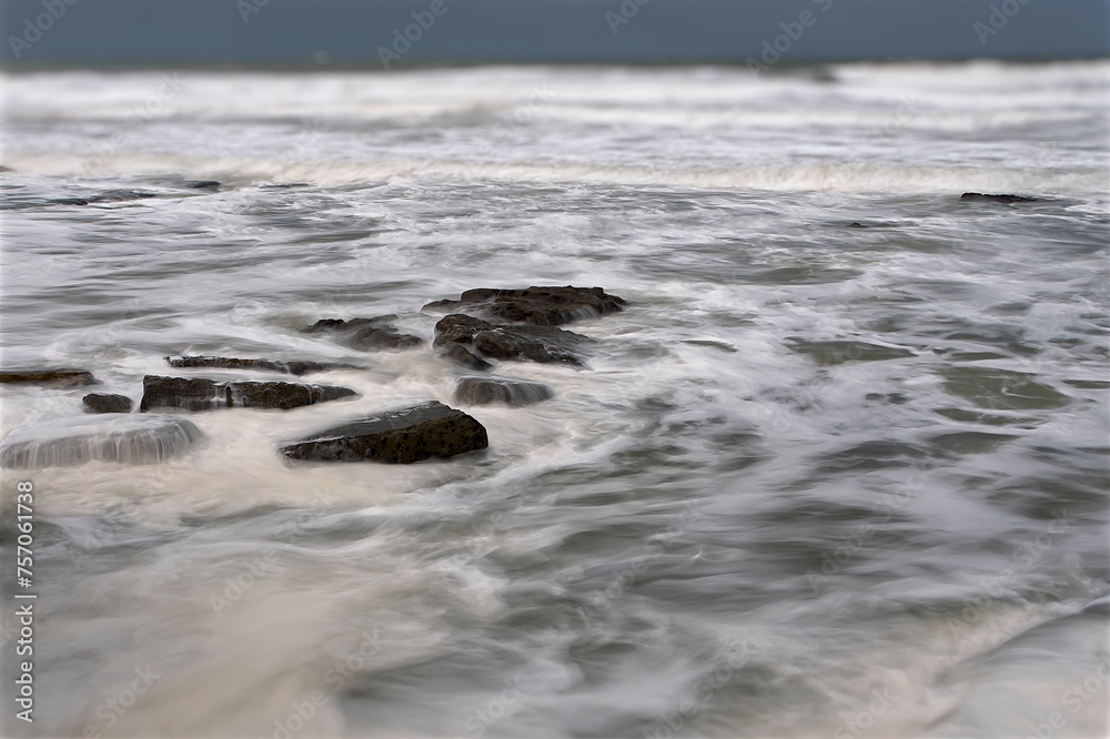 Seascape with waves and rocks. Seascape with waves and rocks.
