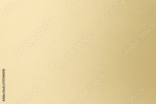 Soft creamy beige tone color paint on environmental friendly cardboard box blank paper texture background with space minimal style photo