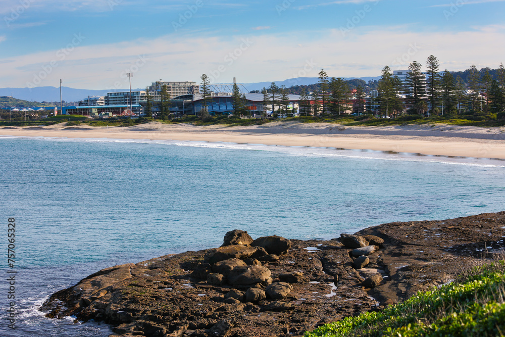 Wollongong Beach and sporting complex, from a rocky peninsula, NSW, Australia.